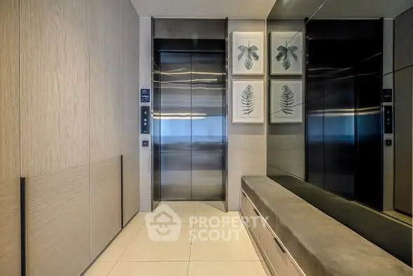 Modern elevator lobby with sleek design and stylish decor