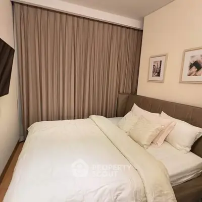 Cozy bedroom with elegant decor and soft lighting, perfect for relaxation.