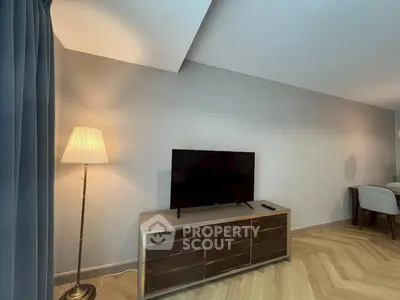 Modern living room with stylish TV stand and floor lamp