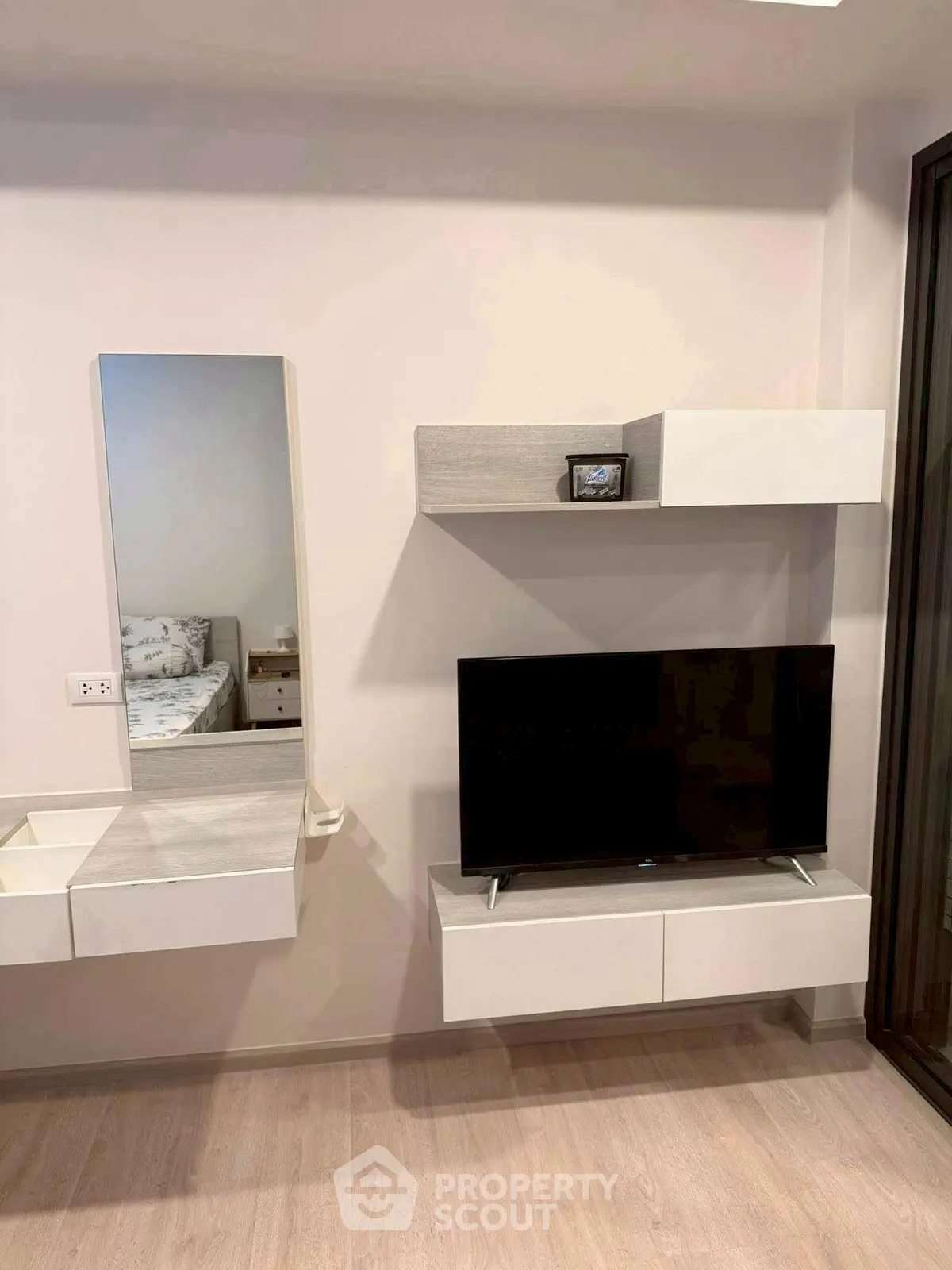 Modern living room with sleek TV setup and stylish decor