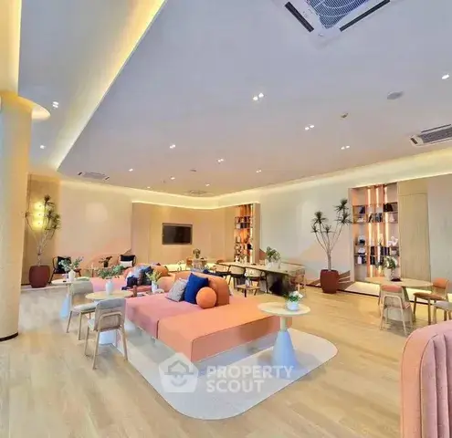 Spacious modern living room with stylish furniture and ambient lighting