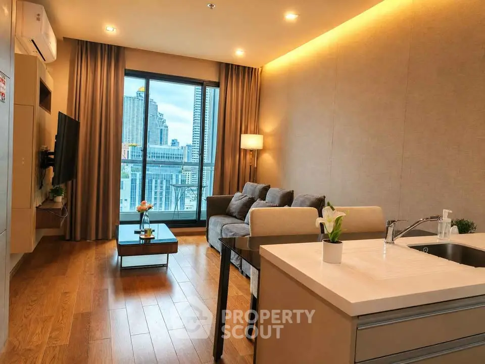 Modern living room with city view, featuring cozy sofa and elegant decor.