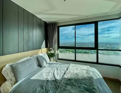 Luxurious bedroom with stunning river view and modern decor