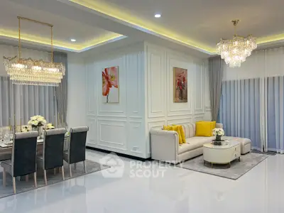 Luxurious living room with elegant chandeliers and modern decor