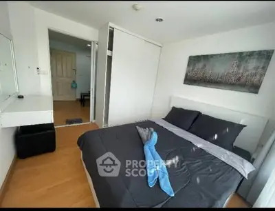 Modern bedroom with stylish decor and ample natural light