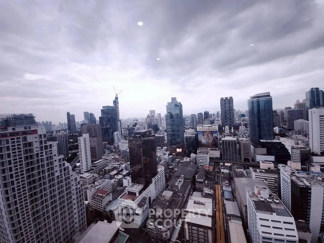 Stunning cityscape view showcasing modern skyscrapers under a dramatic cloudy sky.