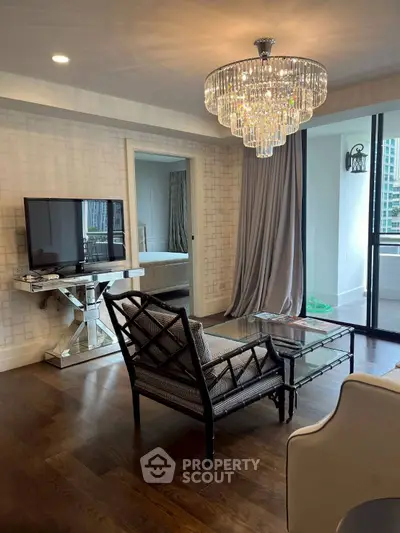 Luxurious living room with elegant chandelier and modern decor