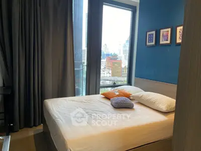 Modern bedroom with city view and stylish decor