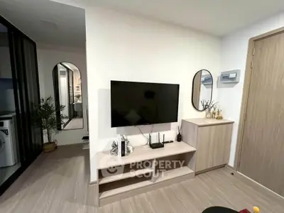 Modern living room with sleek TV setup and stylish decor