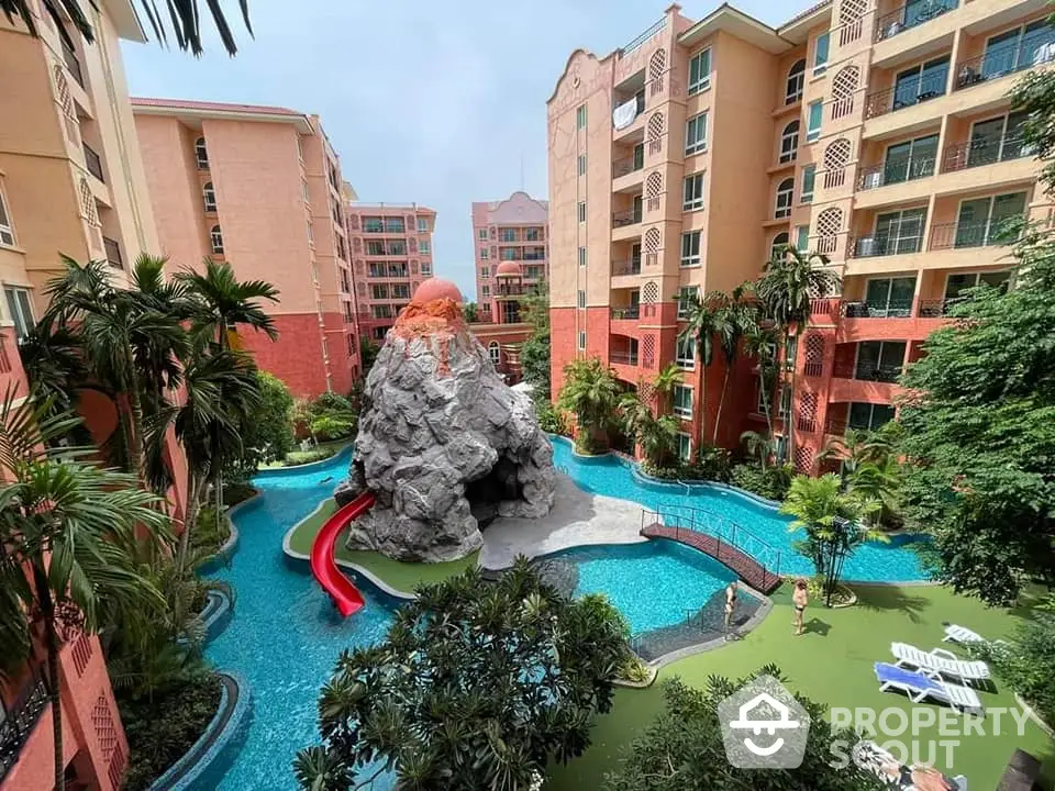 Luxurious apartment complex with tropical pool and rock slide