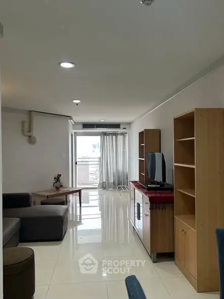 Spacious living room with modern furniture and natural light