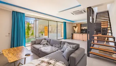 Luxurious modern living room with pool view and stylish interior design.