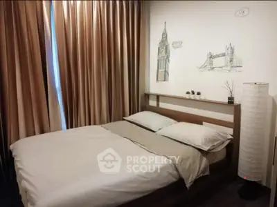 Cozy bedroom with elegant decor and soft lighting, featuring a comfortable bed and stylish curtains.