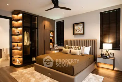 Luxurious bedroom with modern decor, elegant lighting, and spacious walk-in closet.