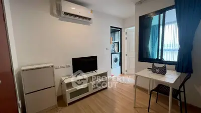 Cozy living room with modern appliances and stylish decor