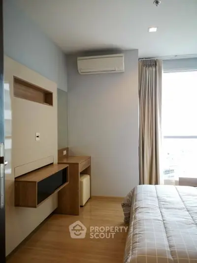 Modern bedroom with air conditioning and natural light