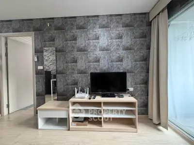 Modern living room with stylish textured wall and sleek TV stand, perfect for contemporary living.
