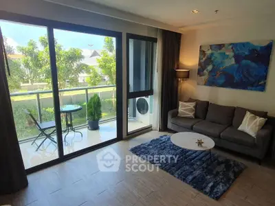 Modern living room with large windows and balcony view