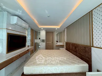 Luxurious modern bedroom with elegant design and ambient lighting