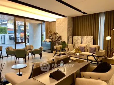 Luxurious modern living room with elegant furniture and large windows