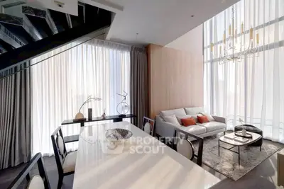 Luxurious modern living room with high ceilings and elegant decor