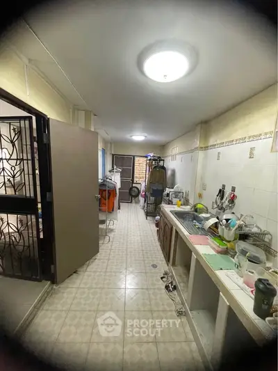 Spacious kitchen with open layout and ample storage space