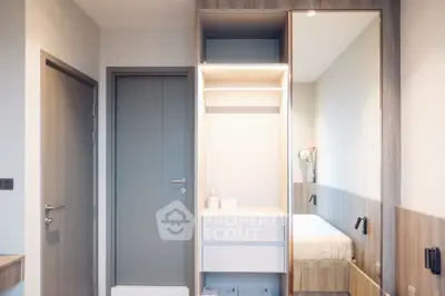 Modern bedroom with sleek built-in storage and minimalist design