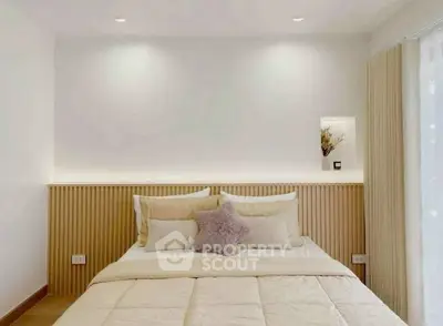 Cozy and modern bedroom with elegant decor and soft lighting
