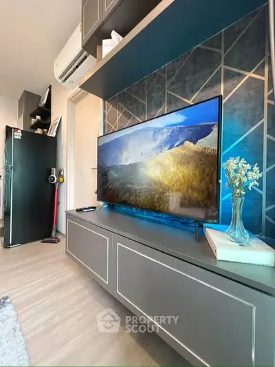 Modern living room with sleek TV setup and stylish decor