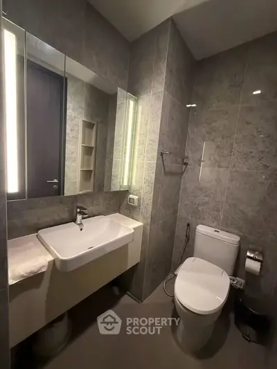 Modern bathroom with sleek fixtures and elegant tile design