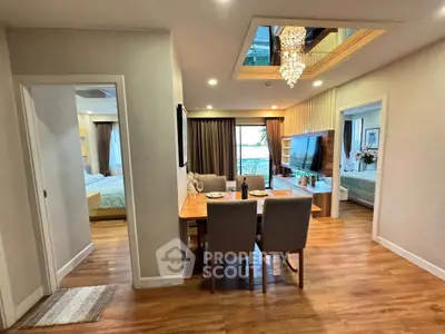 Spacious modern living room with elegant dining area and stylish decor