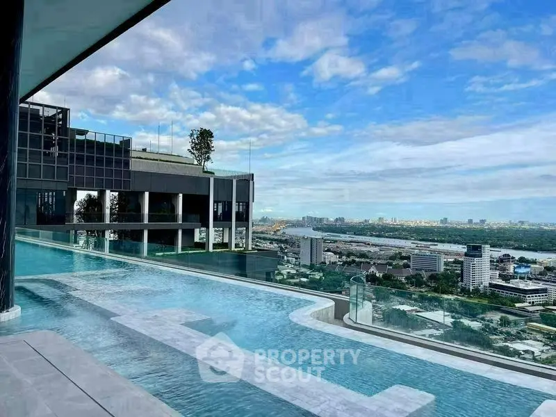Luxurious rooftop infinity pool with stunning city skyline view
