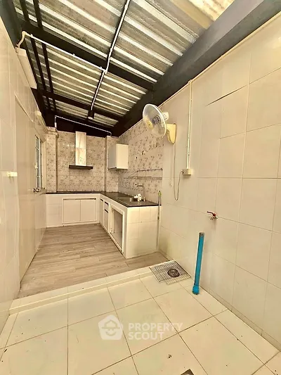 Spacious kitchen with modern open layout and ample natural light