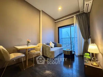 Cozy living room with modern decor and city view balcony