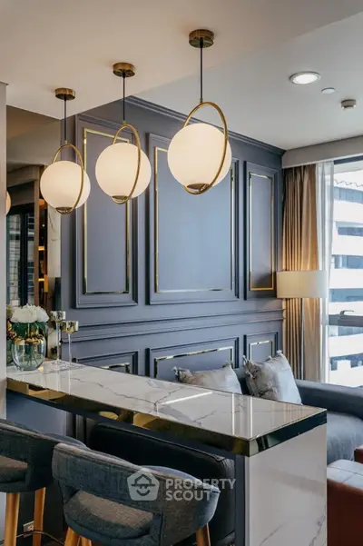 Luxurious modern living room with elegant lighting and marble accents