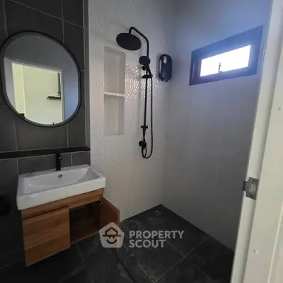 Modern bathroom with sleek fixtures and stylish tile design