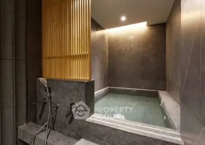 Luxurious bathroom with modern bathtub and elegant lighting