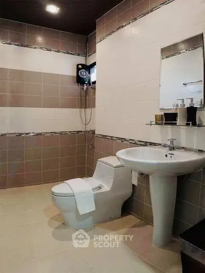 Modern bathroom with sleek fixtures and stylish tile design