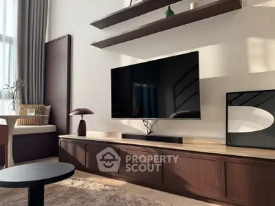 Modern living room with sleek TV setup and stylish decor