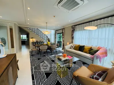 Luxurious living room with modern decor and stylish furniture in open layout