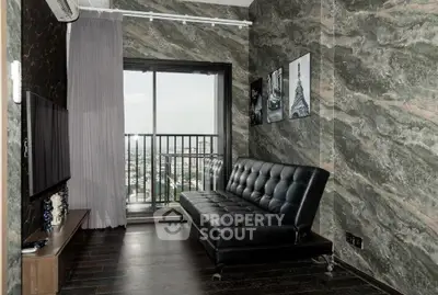 Stylish living room with modern decor and city view balcony