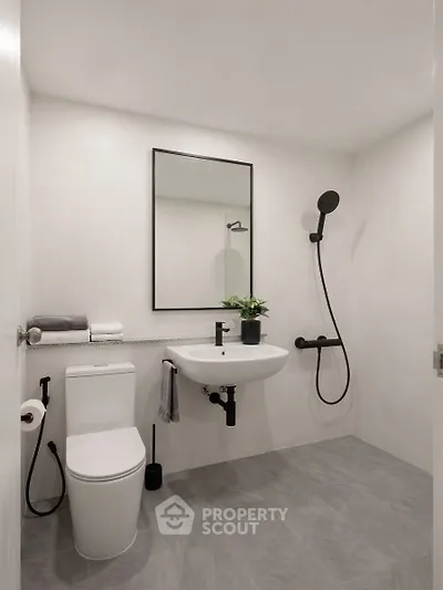 Modern minimalist bathroom with sleek fixtures and neutral tones