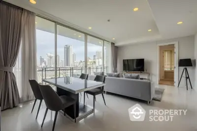 Spacious modern living room with city view and elegant decor