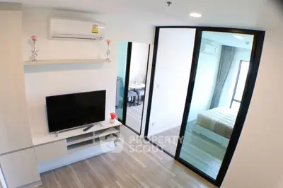 Modern apartment interior with sleek living room and cozy bedroom view