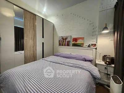 Cozy bedroom with modern decor and ample storage space