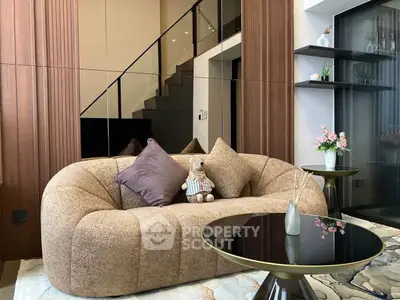 Stylish modern living room with plush sofa and elegant decor