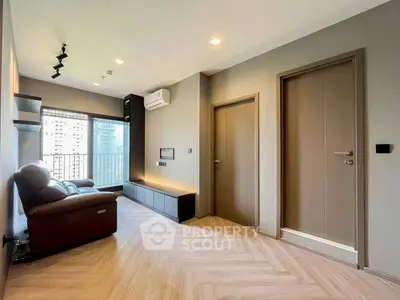 Modern living room with sleek design and city view balcony