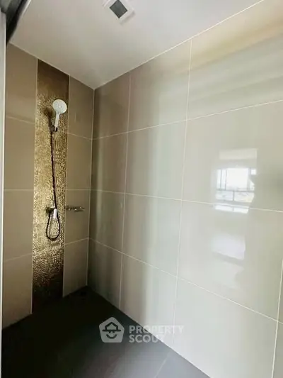 Modern bathroom with sleek shower design and elegant tile work