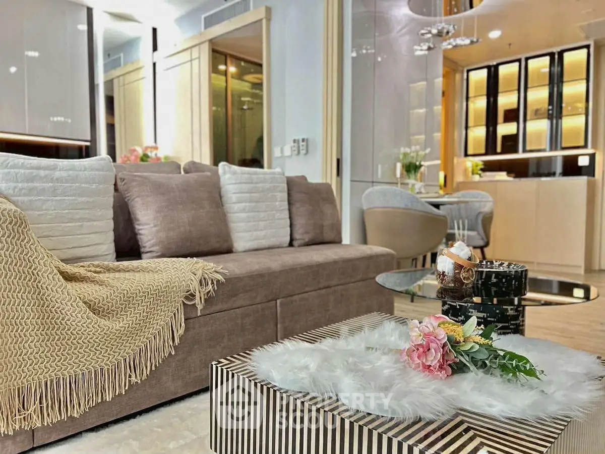 Luxurious living room with elegant decor and modern furniture in a stylish apartment.