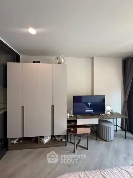 Modern living room with sleek furniture and entertainment setup